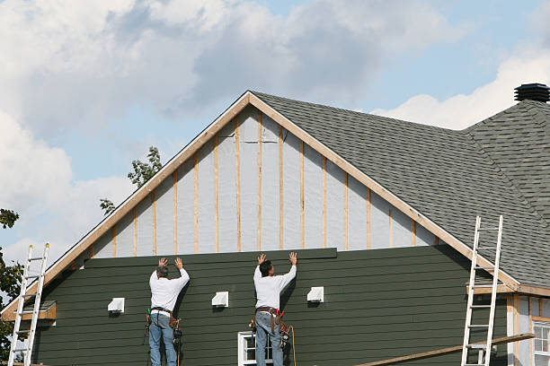 Professional Siding Contractor technician working in Plano, IL